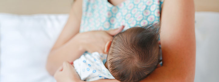 Woman breastfeeding her child