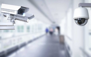 Security cameras in a building hallway