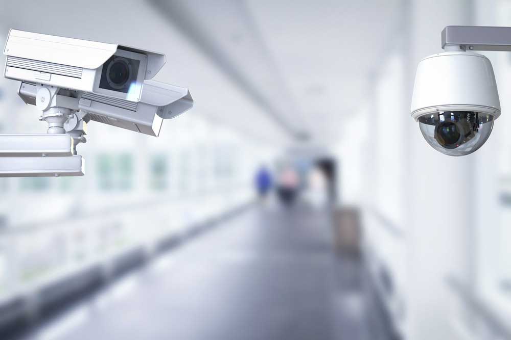 Security cameras in a building hallway